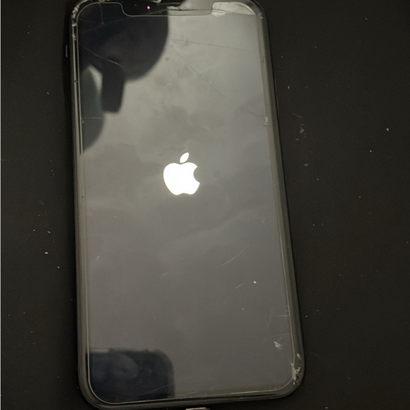black I phone XR beat up but works like new